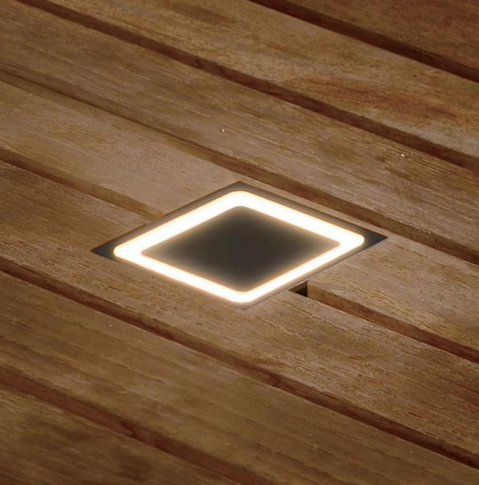 Square Deck Light, Halo, a square ring of warm light set flush in timber decking