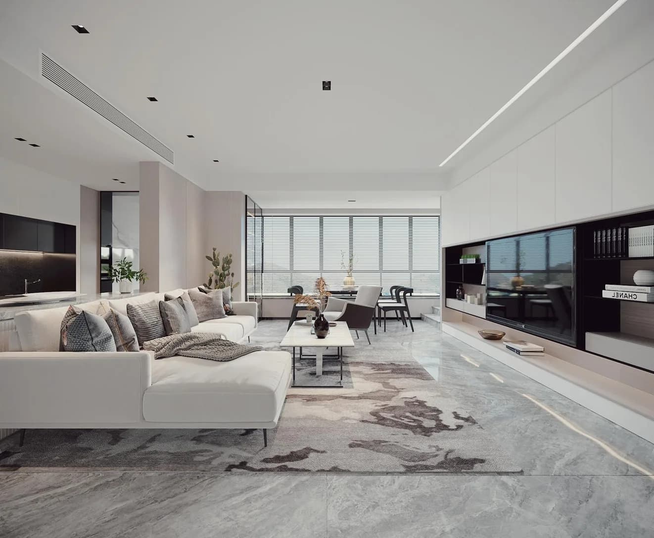 Living room lit by recessed downlights set into a flat plaster ceiling